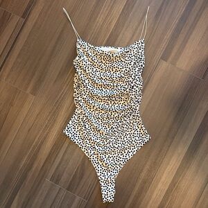 H&M Black and Cream Polka Dot Bodysuit